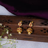 Leaves Studded In CZ And Pink Stone Earrings 18kt Gold Polish