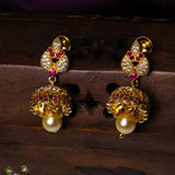 Leaves Studded In CZ And Pink Stone Earrings 18kt Gold Polish