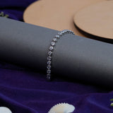 Classic Solitaire Tennis Bracelet In White Gold