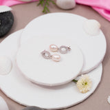 Baguette cut earrings with pearl droplets white gold