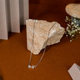 Mistletoe rose gold and white gold pendant with chain