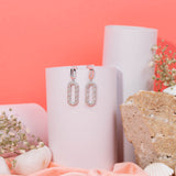 Lumina Dangles Earrings In White Gold