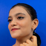 Circle Dangle Earrings In White Gold