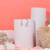 Princess cut drop Earrings in White Gold