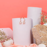 Princess cut drop Earrings in Rose Gold