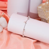 Dangling Pearls Bracelet in White Gold