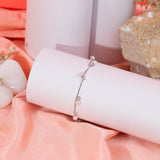 Dangling Pearls Bracelet in White Gold
