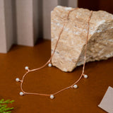 Dangling Pearls Pendant Chain in Rose Gold