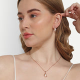 Caged pearl pendant set rose gold