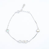 Infinity Bracelets with hearts in white Gold