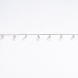 Dangling Pearls Bracelet in White Gold
