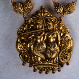 Elegant Radha Krishna Deep Nakas Pendant with Red Ruby Chain in Antique Gold Plated Long Necklace