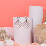 Square Dangle Earrings In White Gold
