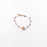 Evil Eye Bracelet studed with blue stones in Rose Gold